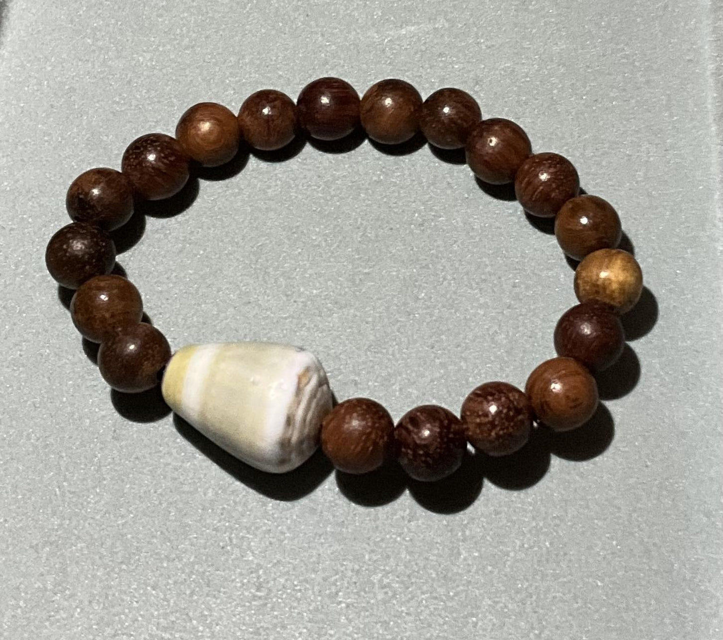 Kulaiwi: 6" Makaha Cone Shell &Polished Iliahi Bracelet (7mm)